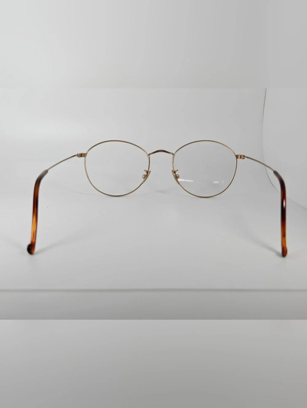 Village 16. 51-19. Lightweight Round Metal Frame Glasses in Gold with Brown Rim